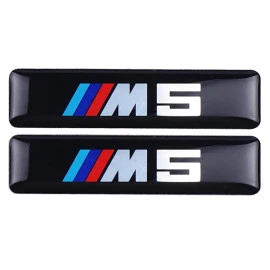 Αυτοκόλλητα σμάλτου σήμα BMW M5 5.5x1.2cm  2τμχ Αυτοκόλλητα σμάλτου σήμα BMW M5 5.5x1.2cm  2τμχ